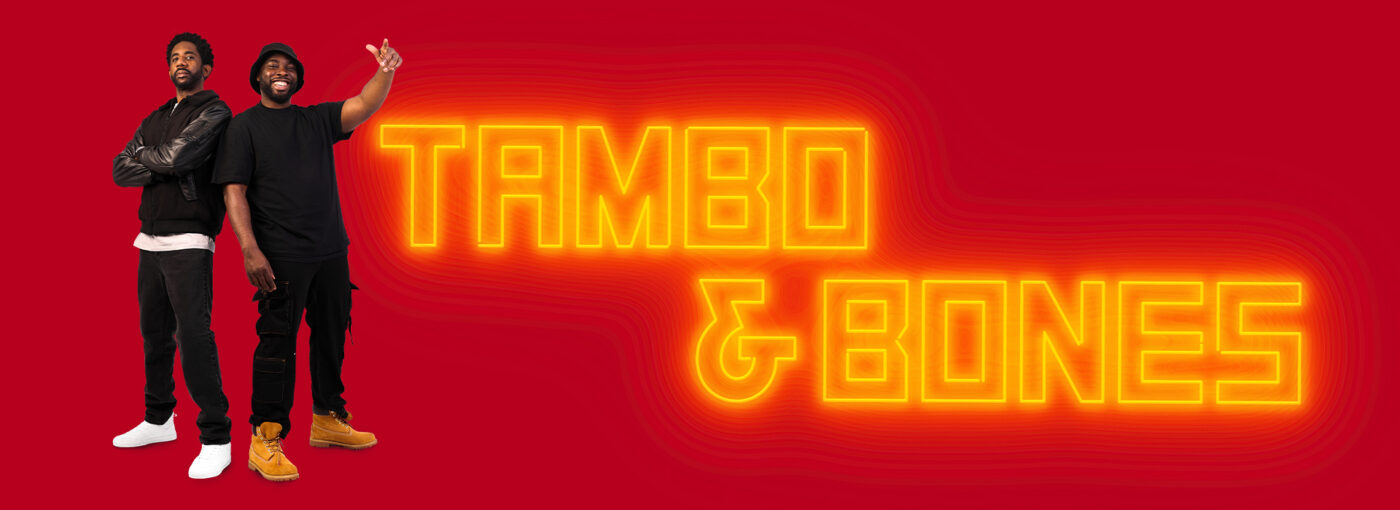The poster for Tambo & Bones, with a red background, showing two black men leaning against each other, and the text "Tambo & Bones" in neon yellow